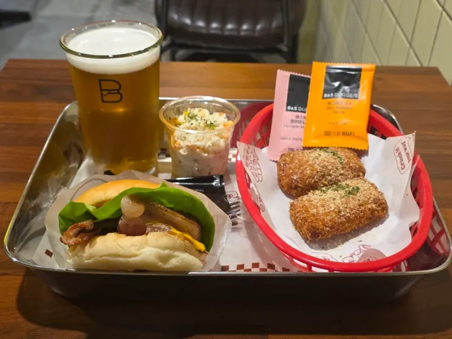 Hawaiian burger set and sides served on a tray