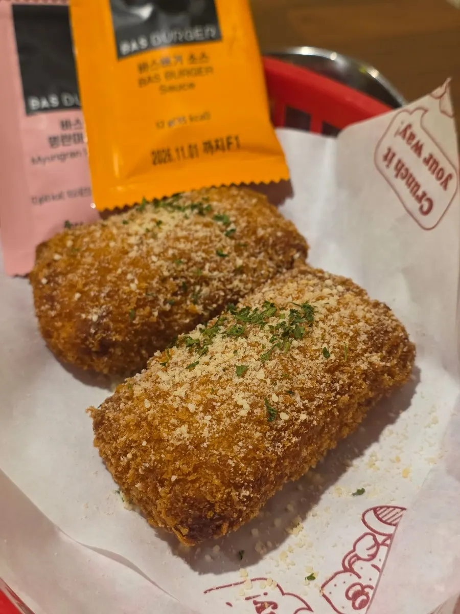 Two golden fried mozza chicken bites
