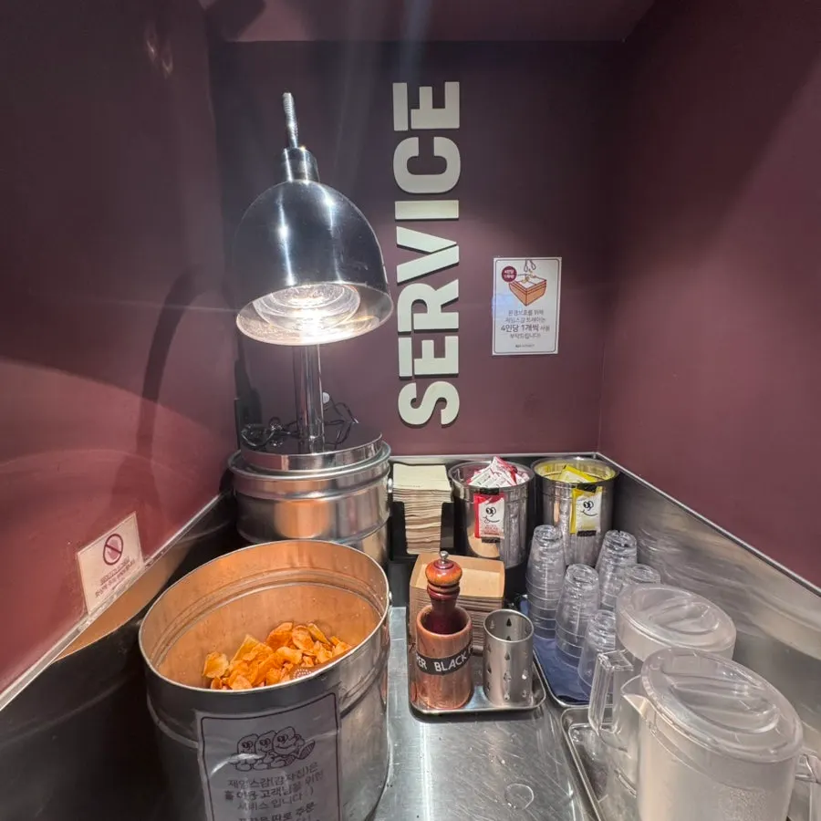 Self-serve corner with chips and sauces