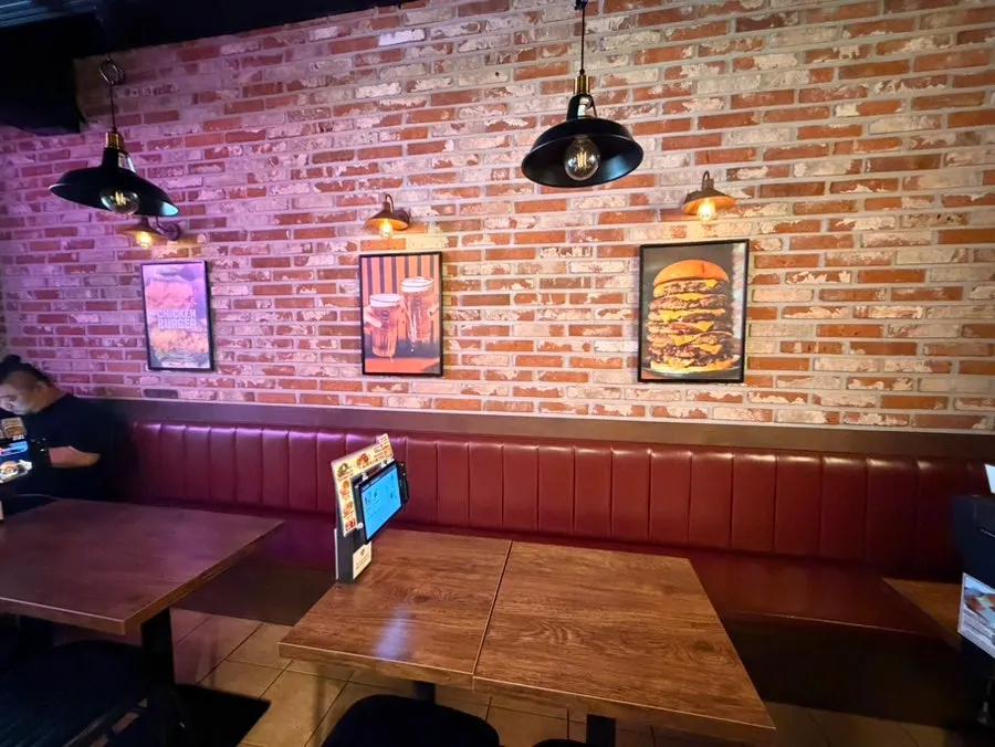 Long, narrow dining hall at BAS Burger Seonyudo
