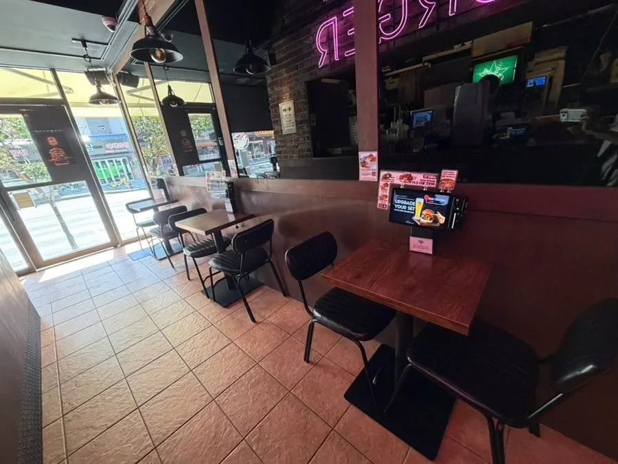 Interior with two-top and four-top tables