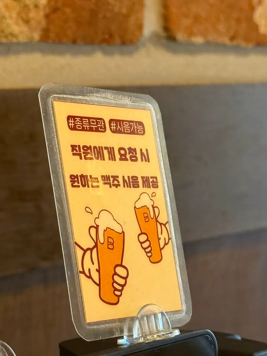 バスバーガー新龍山店のメニュー表の縦写真