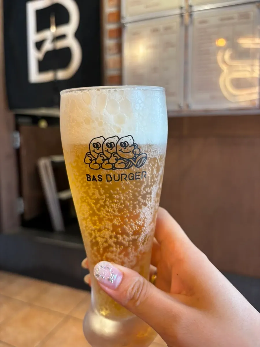 Glass of cold draft beer ordered as an extra