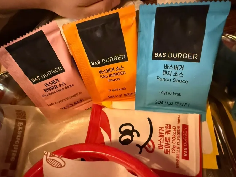 Three sauces: mentaiko mayo, Bass Burger sauce, and ranch