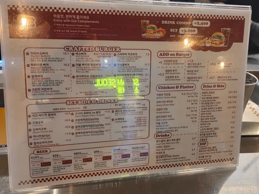The Bass Burger Sinyongsan menu board