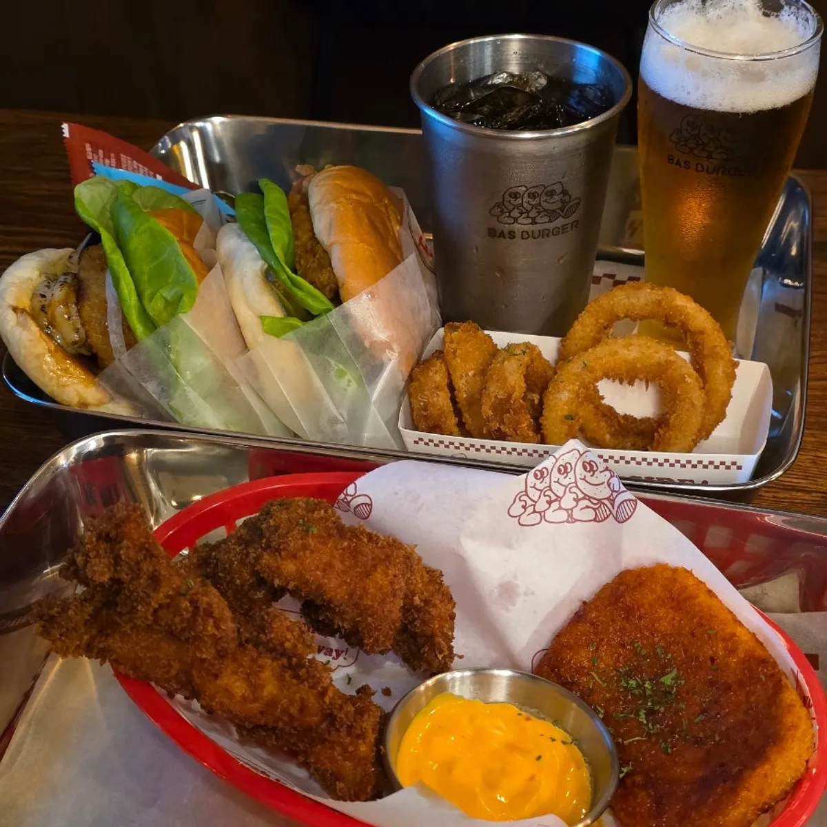 Table view with burgers and beer