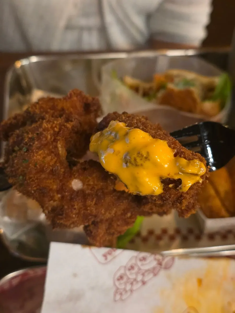 Cross-section of a piece of crunchy chicken