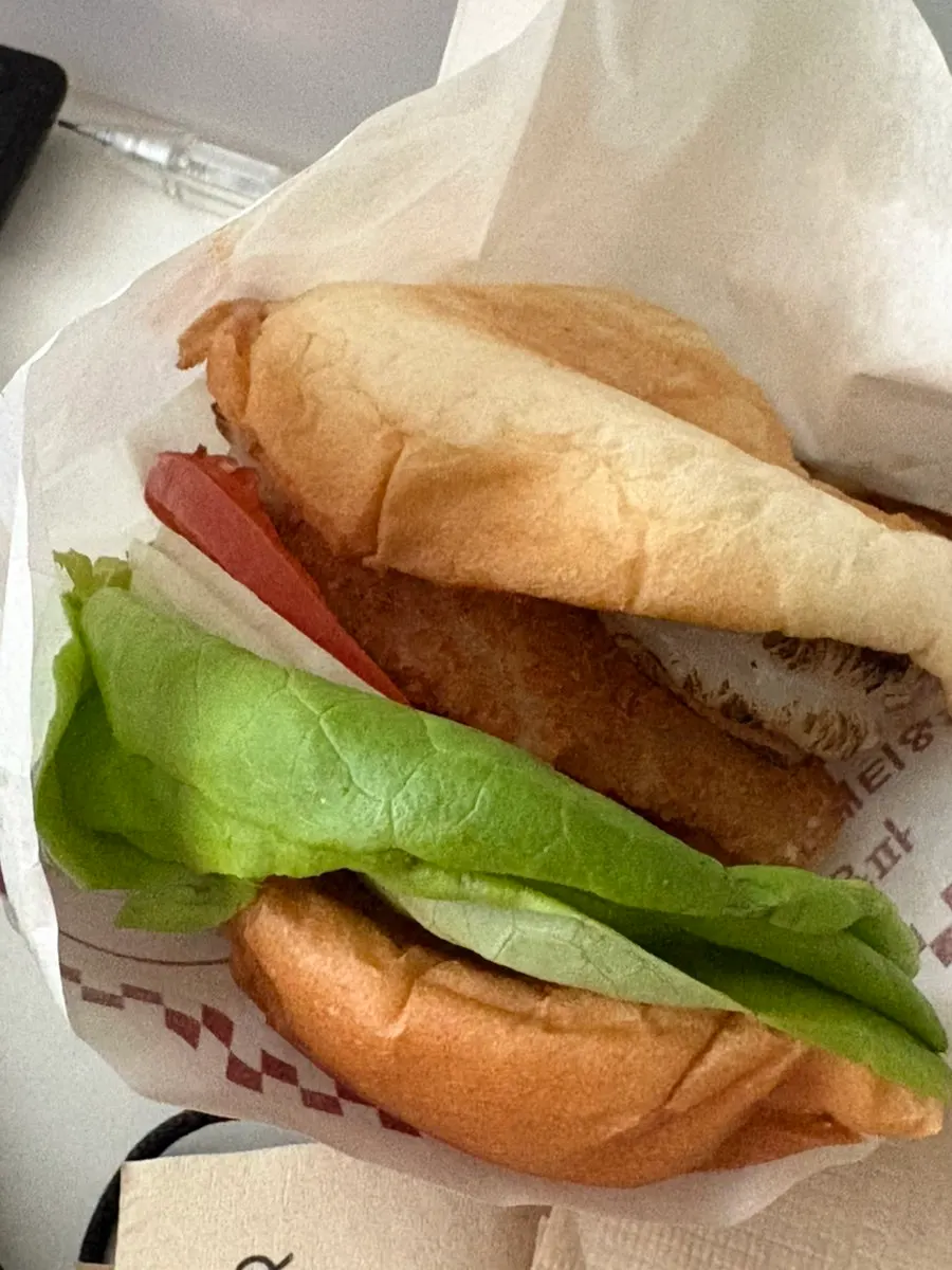 Takeout wasabi mayo shrimp burger with side items