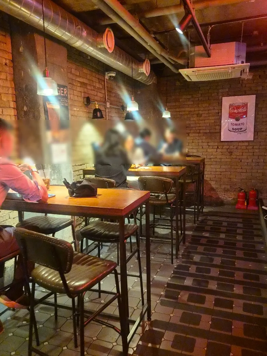 Lighting and seating inside BAS Burger Euljiro Branch