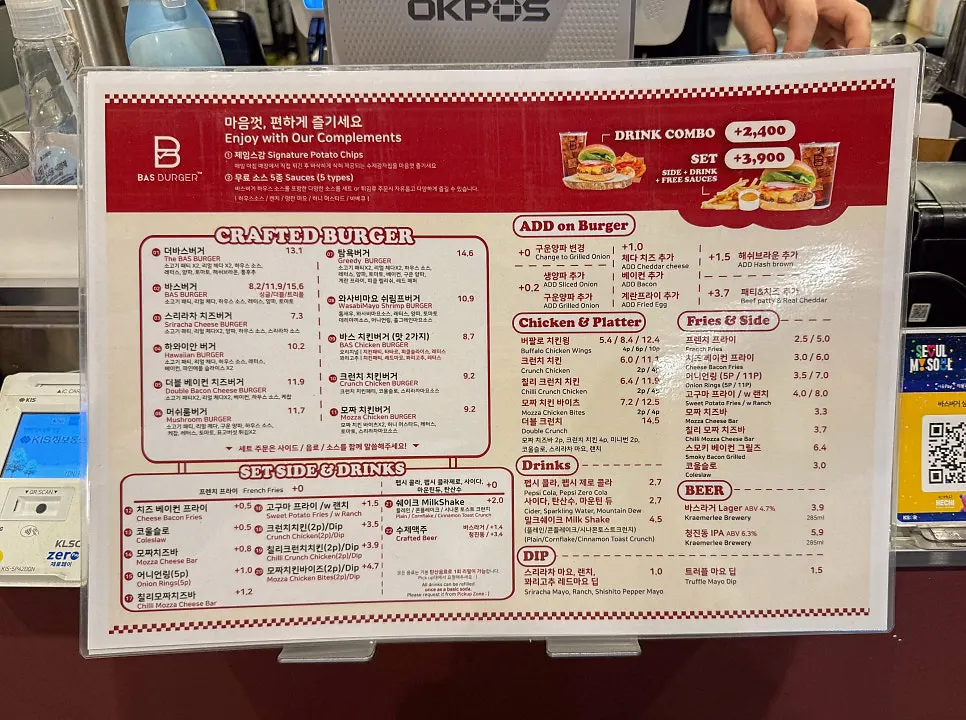 Bas Burger menu board showing single, double, and triple patty options