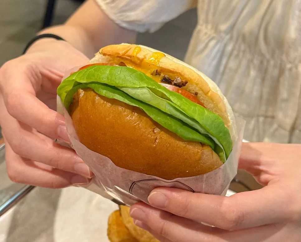 Cross-section of the Bas Burger showing a juicy patty