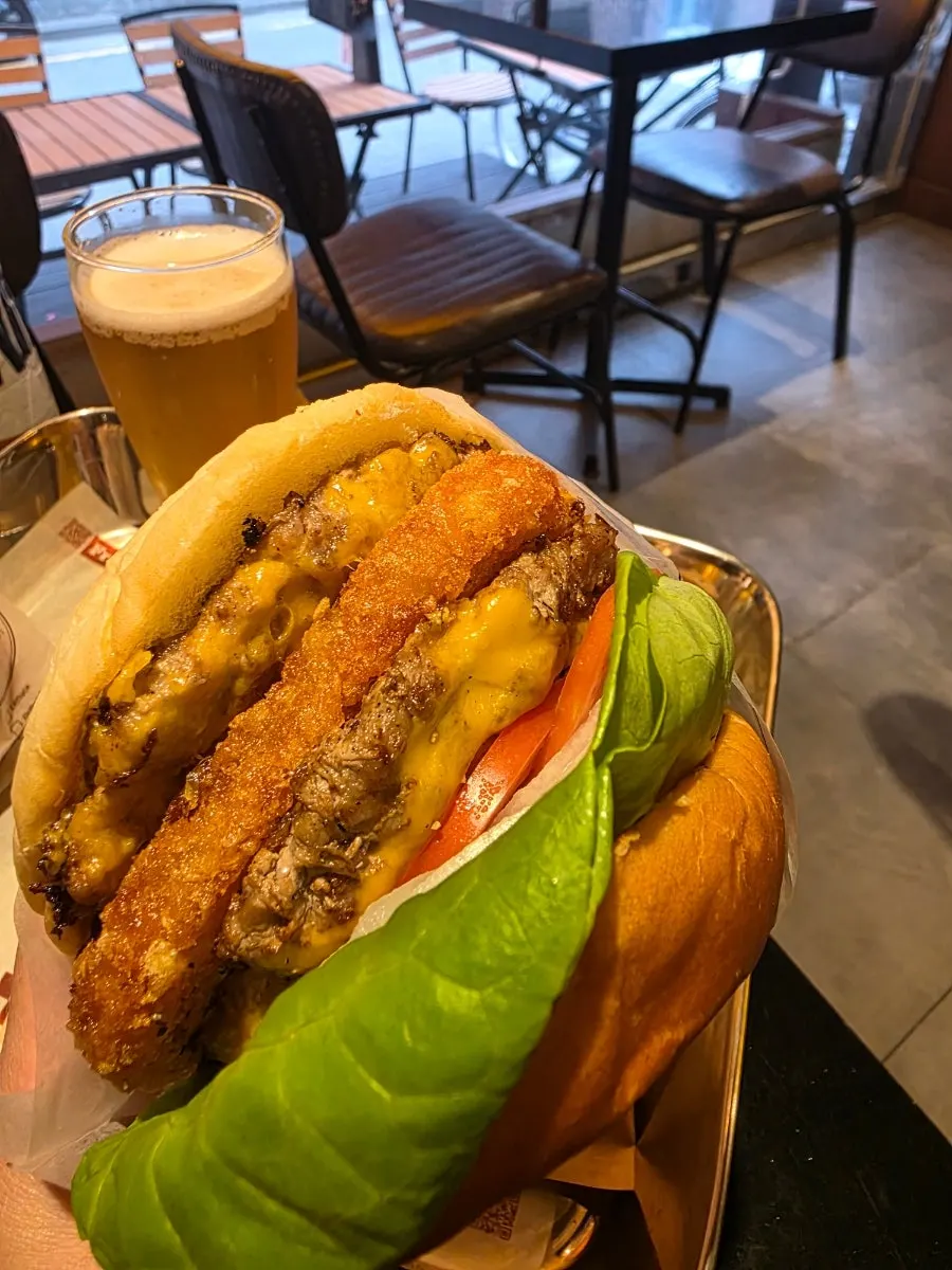 Table with burgers and beer