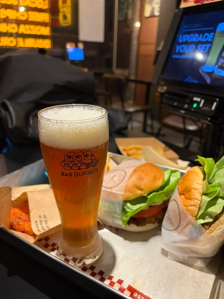 Taking a bite of the burger