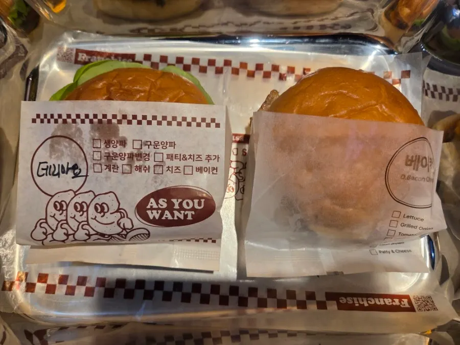 Close-up of a handmade burger stacked with bun and patty