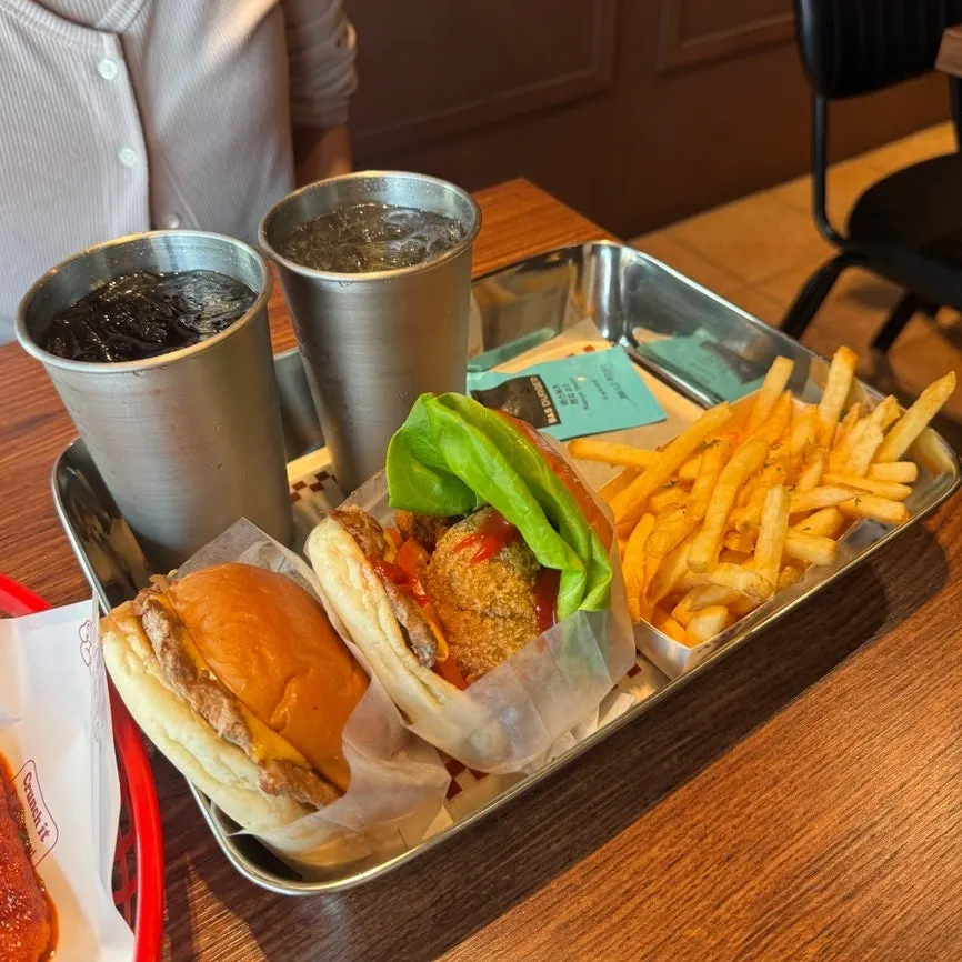 Order laid out on a stainless steel tray at Base Burger