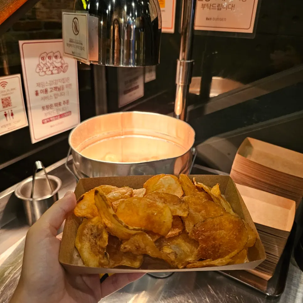 A plate of thin potato chips from the self-serve bar