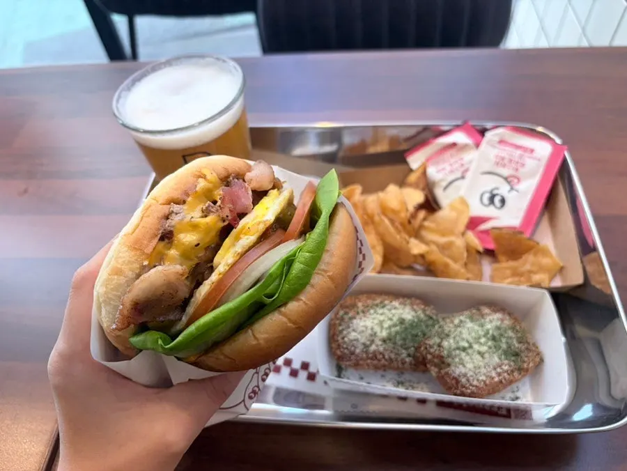 A tray fully loaded with the burger meal