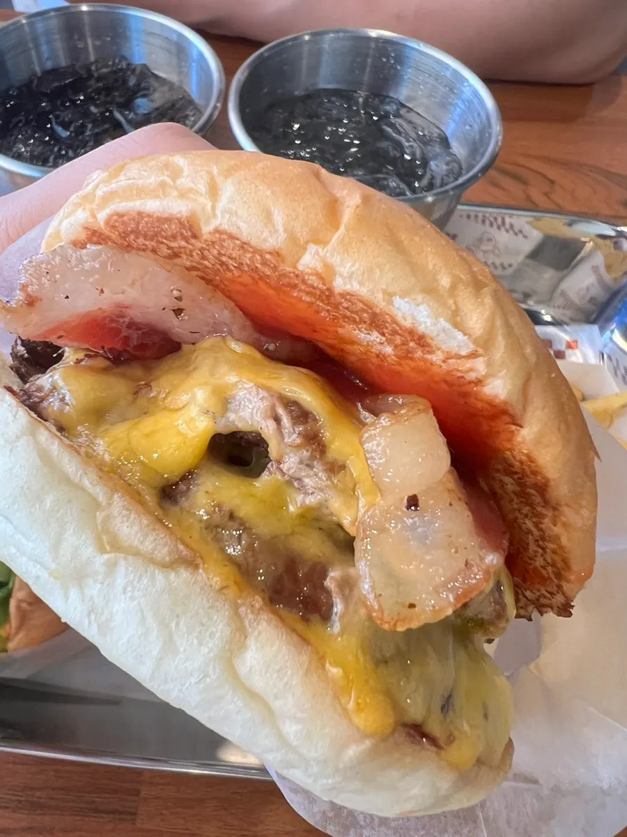 Double bacon cheeseburger stacked with bacon and patties