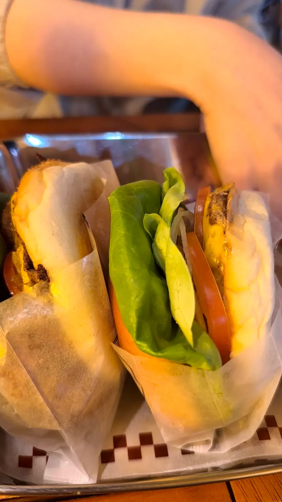 Cross-section of a handmade burger with a bite taken out