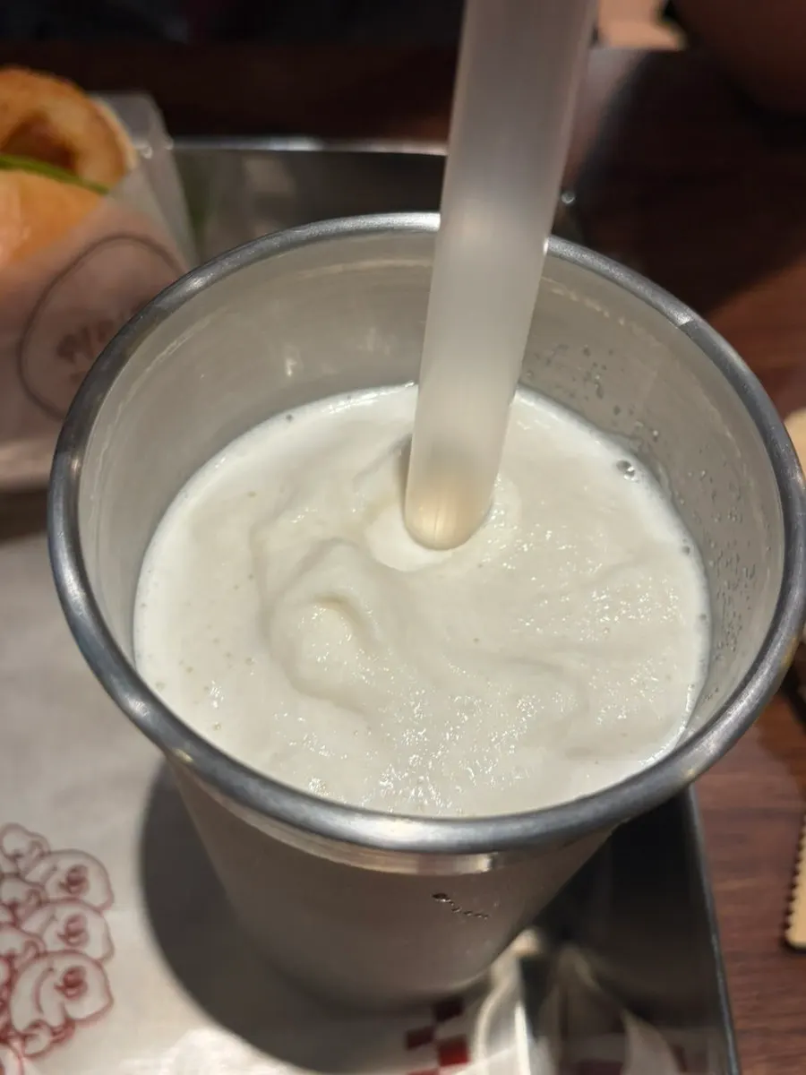 A glass of Base Burger's milkshake
