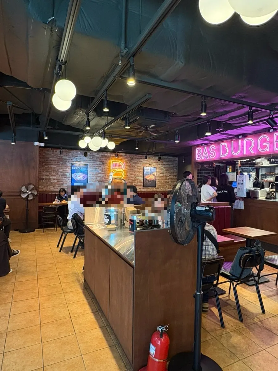Nearly full seating at Bas Burger during lunchtime