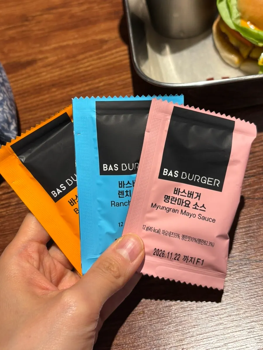 Cups of house sauce, pollack roe mayo, and other sauces