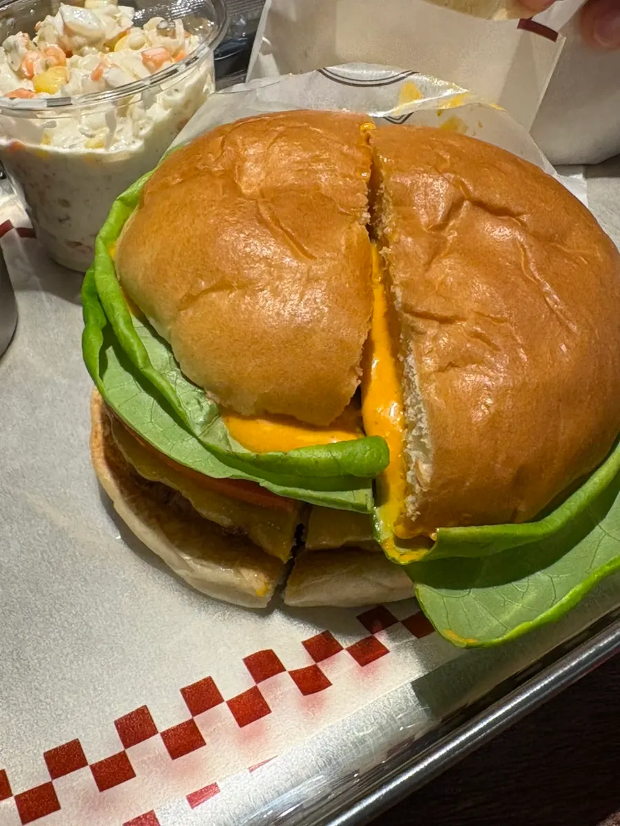 Cross-section of the Bas Burger showing leaf greens and tomato