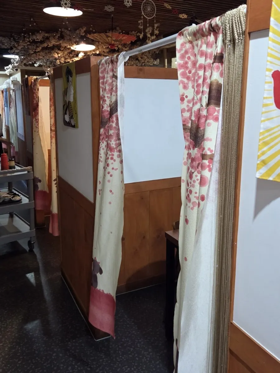 Wood-toned interior of Ppong Sashimi