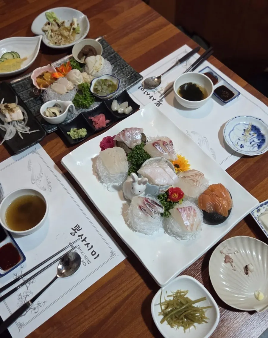 Plate of live-fish sushi and shrimp sushi