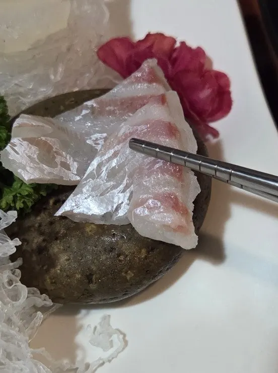 Aged sashimi plate including salmon sashimi