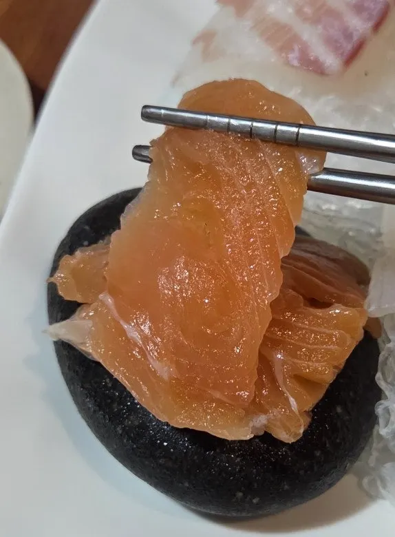A piece of white-fleshed fish aged sashimi, including milchi