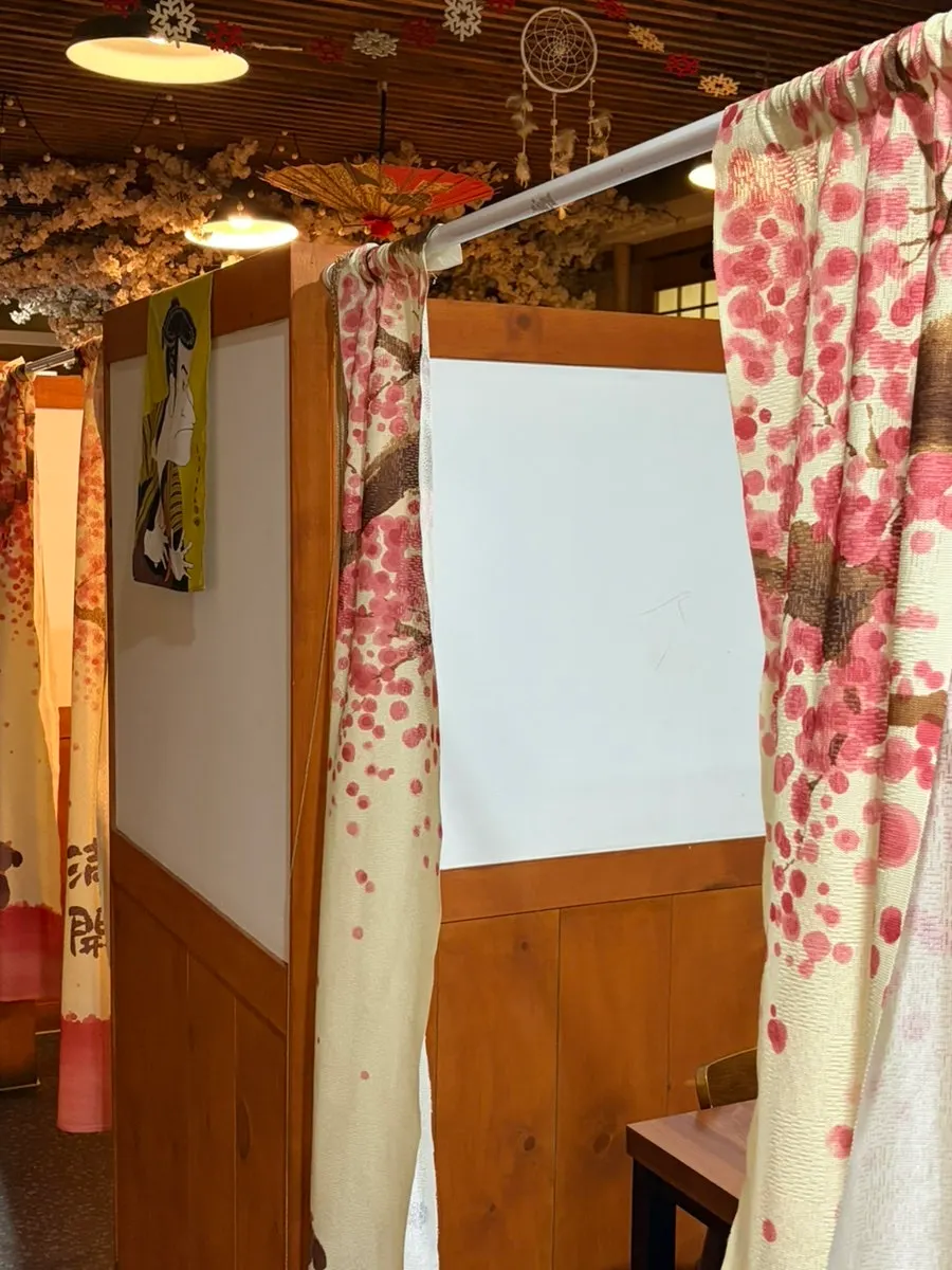 Interior hallway and autograph wall at Ppong Sashimi