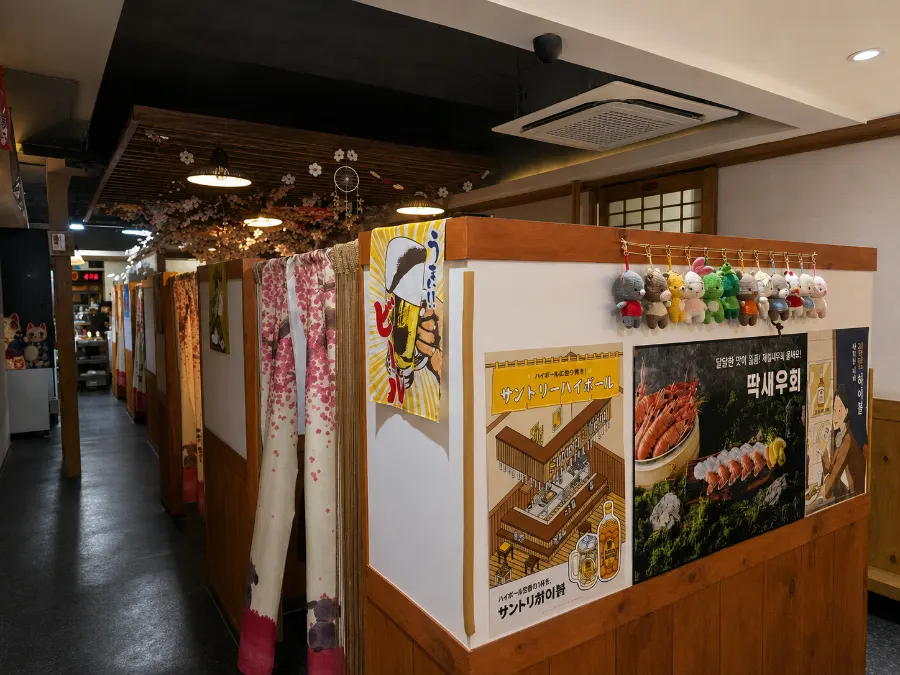 Entrance to Ppong Sashimi with bamboo-style decoration