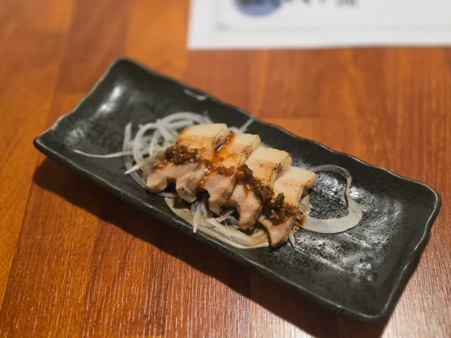 Three kinds of sushi: white fish, salmon, and sweet shrimp