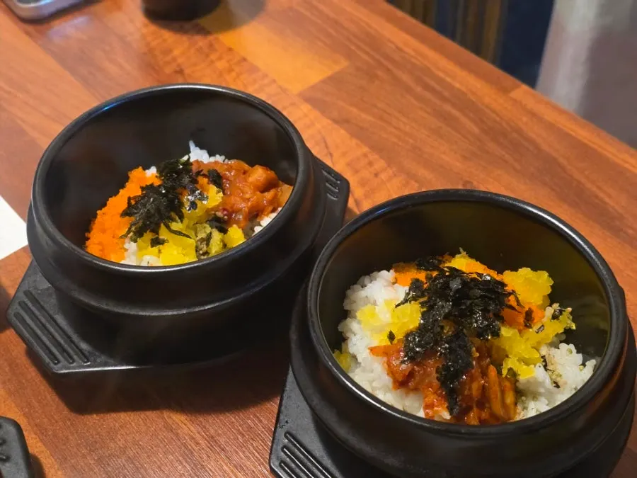 Egg rice served in an individual stone hot pot