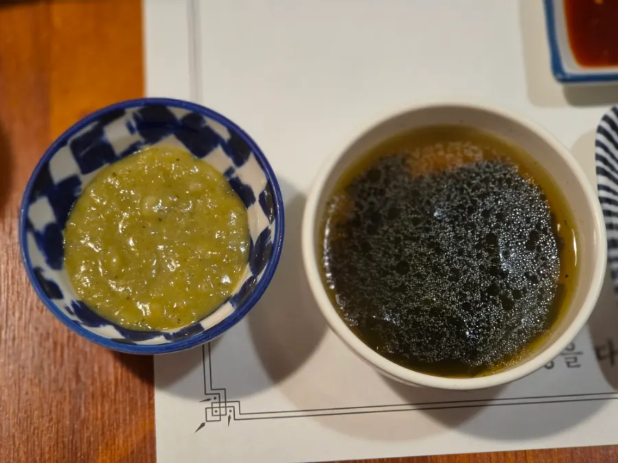 Abalone porridge and seaweed soup with pepper served in the course