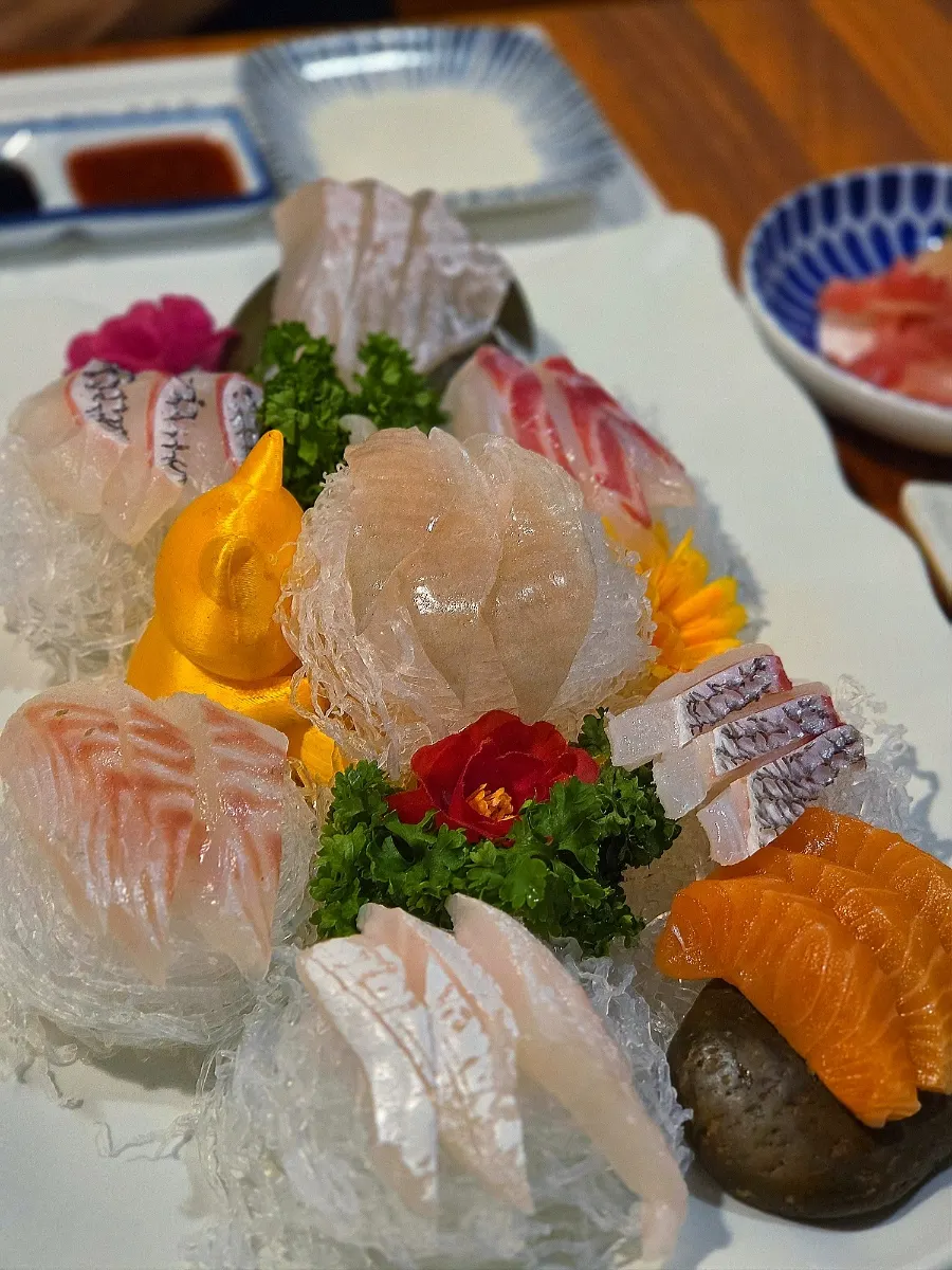 Assorted sashimi of sea bream, flounder, and salmon
