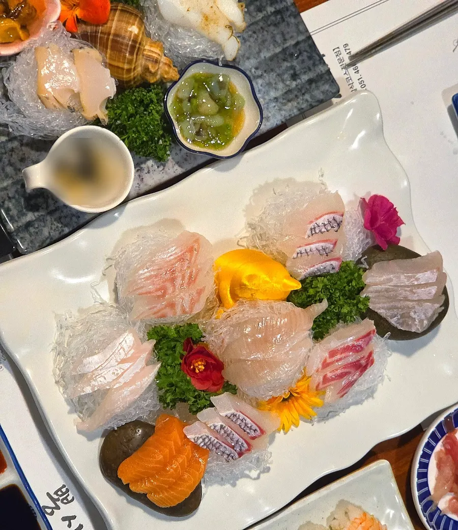 Close-up of thickly sliced assorted sashimi