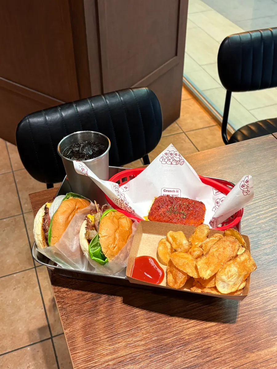 Base double burger and Hawaiian burger served on the table
