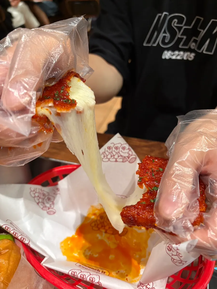 Mozzarella cheese bar coated in chilli sauce