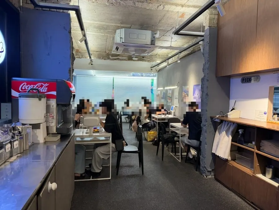 Wide view of seating inside bd Burger Seongsu