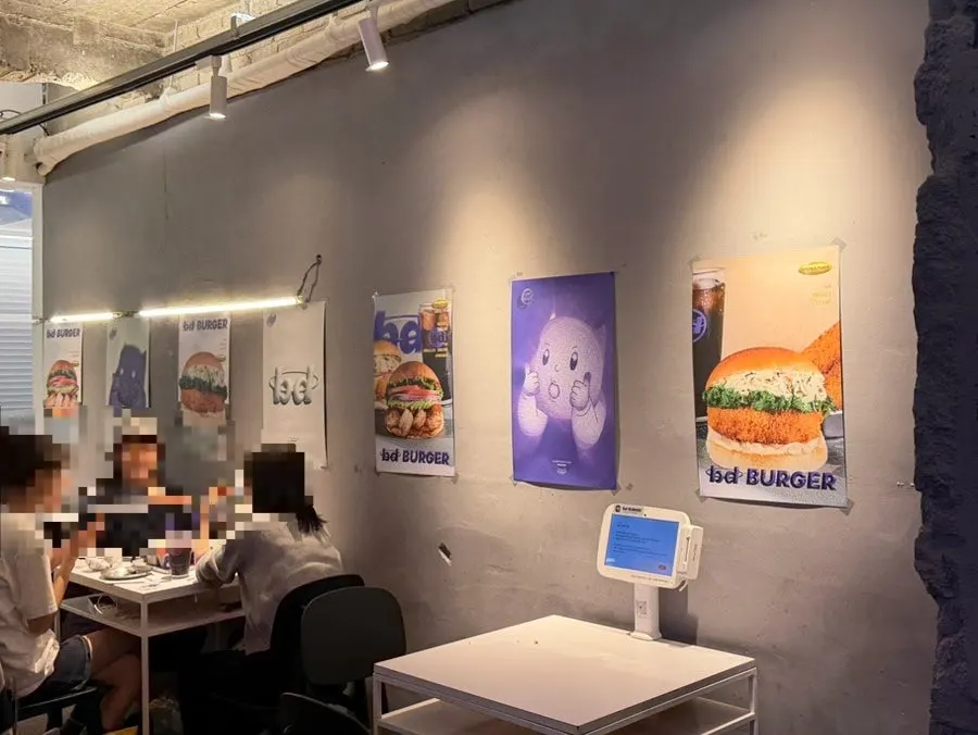 Poster on the wall at bd Burger Seongsu