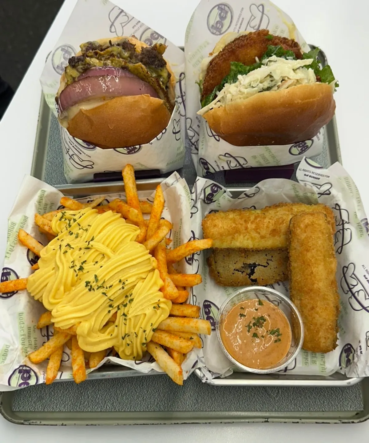 Two burger sets laid out on the table at bd Burger Seongsu