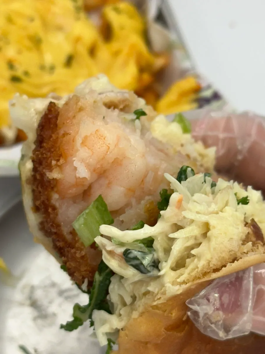 Inside of the shrimp burger with cabbage salad