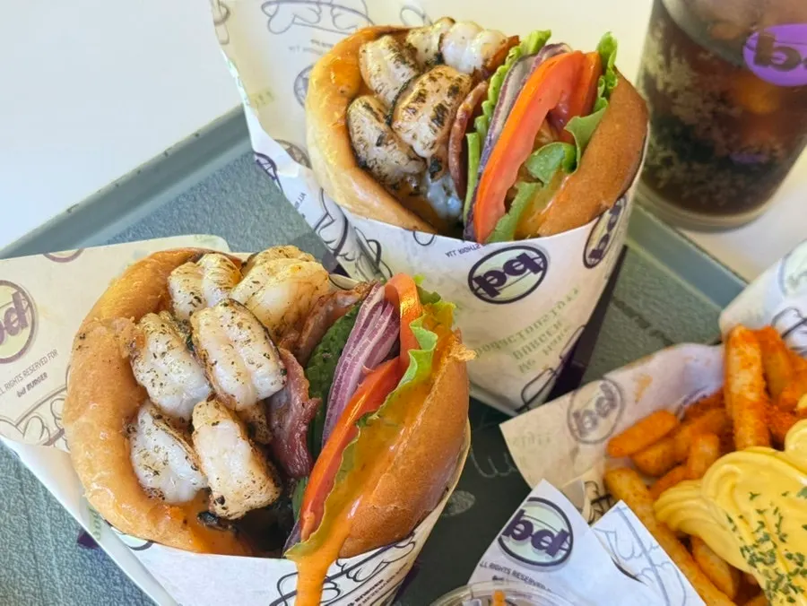 Two Grilled Shrimp Avocado sets on the table