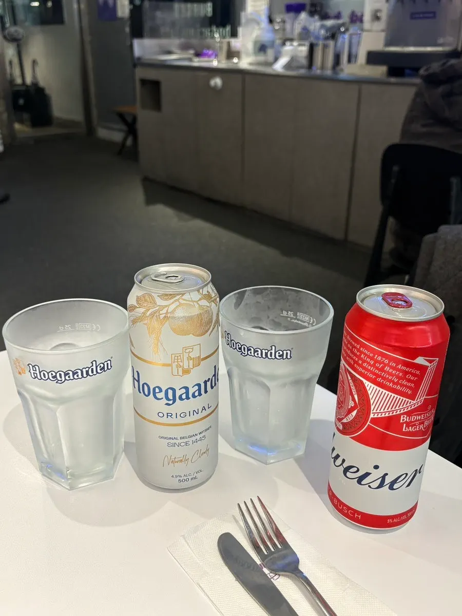 Canned beer served with a glass