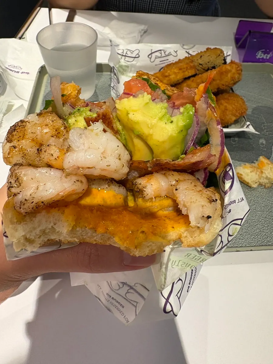 Cross-section of the burger with extra shrimp added