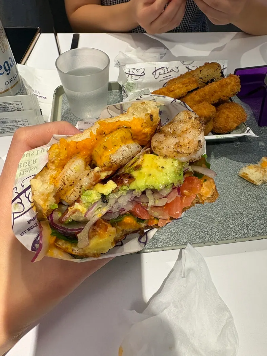 Inside of the burger packed full of whole shrimp