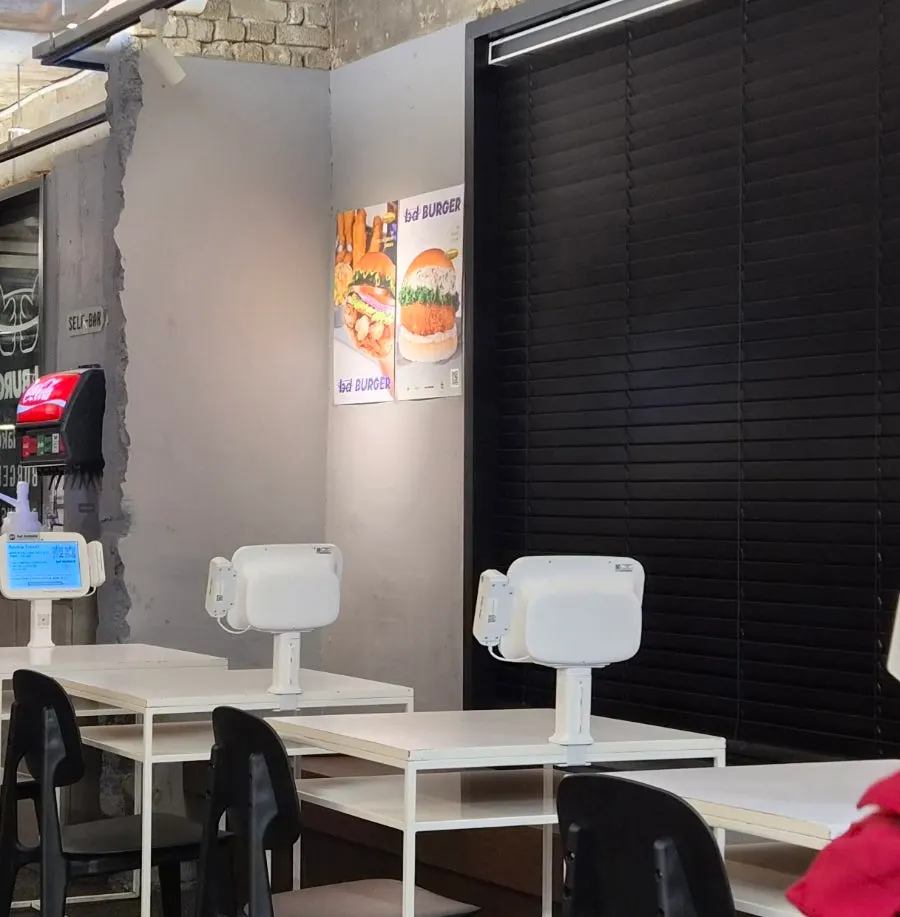 Two-person tables arranged in bd Burger Seongsu