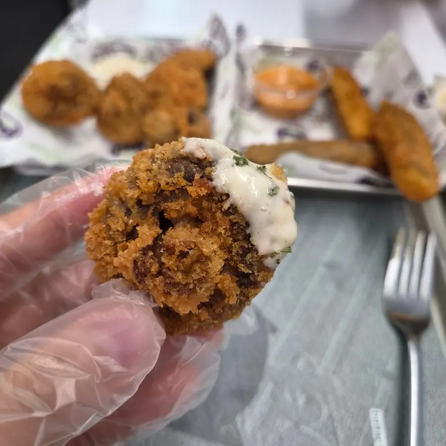 Whole mushroom fritters served with ranch sauce
